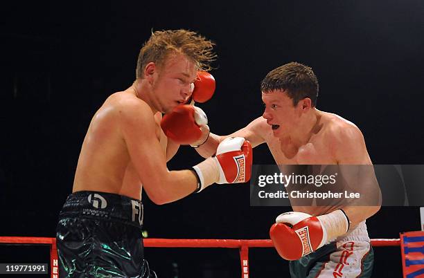 Peter Vaughan connects with a punch on Phill Fury during the Light Middleweight Fight between Phill Fury and Peter Vaughan at Wembley Arena on July...