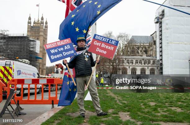 Pro-remain supporter Steve Bray at Parliament Square holding anti Brexit placards during the demonstration. Remain supporters gathered at the...