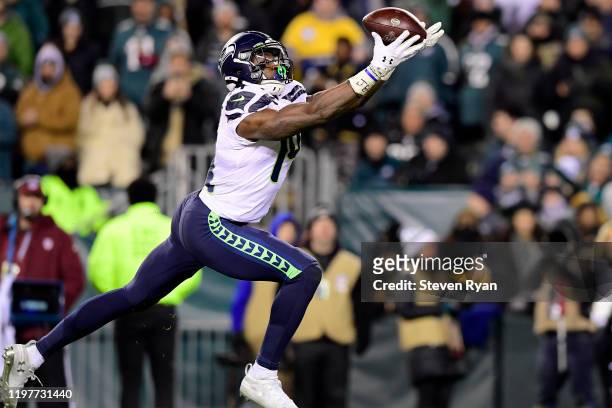 Metcalf of the Seattle Seahawks catches a pass for a touchdown in the third quarter of the NFC Wild Card Playoff game against the Philadelphia Eagles...