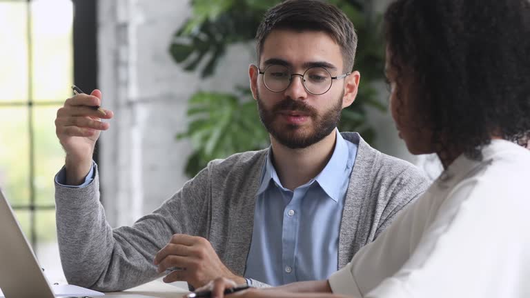 https://media.gettyimages.com/id/1197735843/video/professional-caucasian-mentor-helping-african-intern-with-corporate-software.jpg?b=1&s=640x640&k=20&c=u4XAzxJGf-U7RZNY3WN45eoGUCh3WImxQ5P2ILdtiE8=