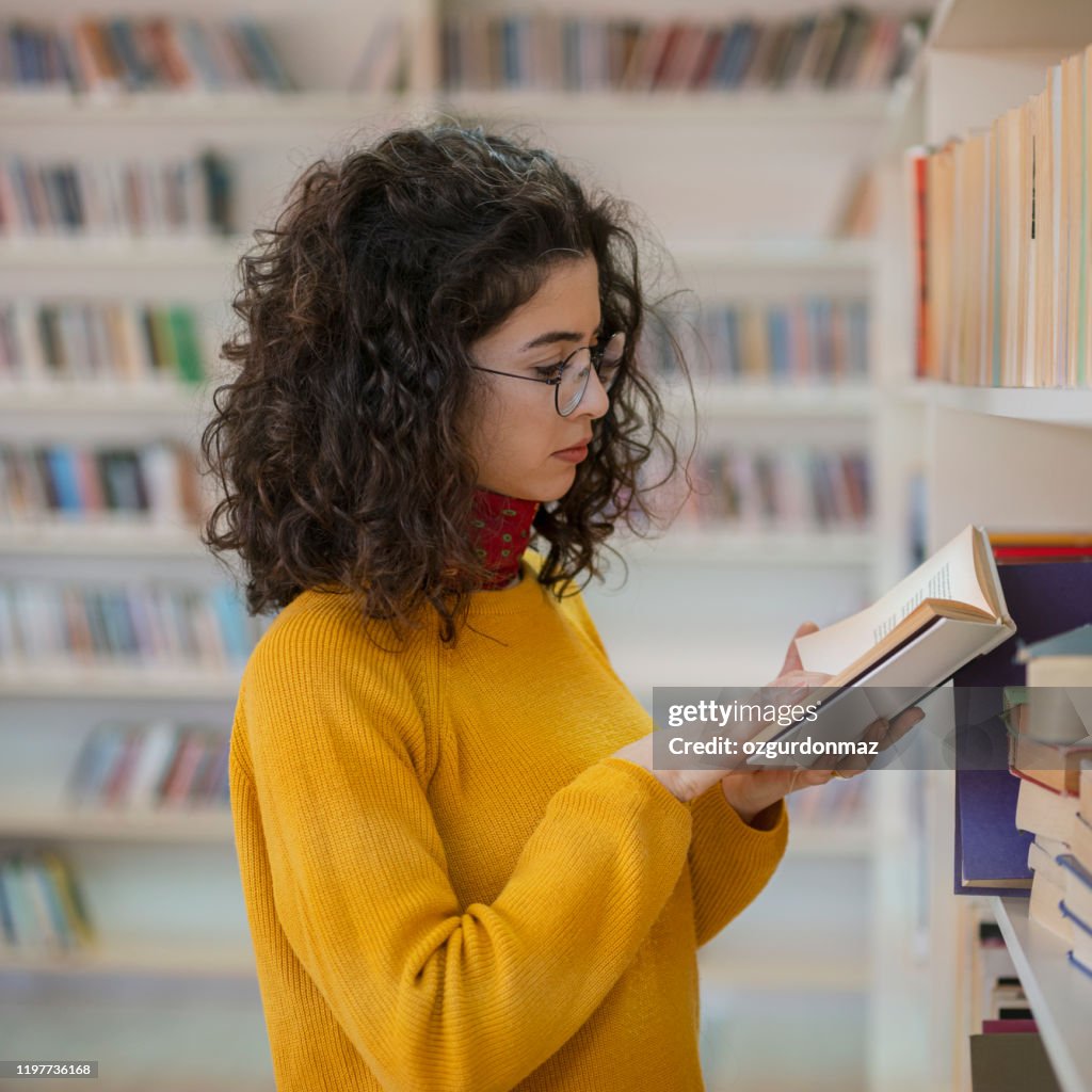 Library Woman Woman In Library High-Res Stock Photo - Getty Images