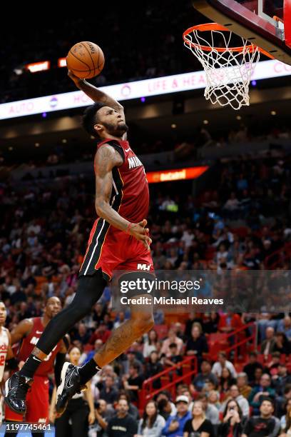 Derrick Jones Jr. #5 of the Miami Heat dunks against the Portland Trail Blazers during the second half at American Airlines Arena on January 05, 2020...