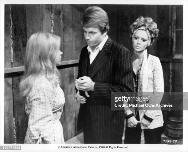 Fabian Forte tries to convince Astrid Warner that he still loves her while Jocelyn Lane watches on in a scene from the film 'A Bullet For Pretty...