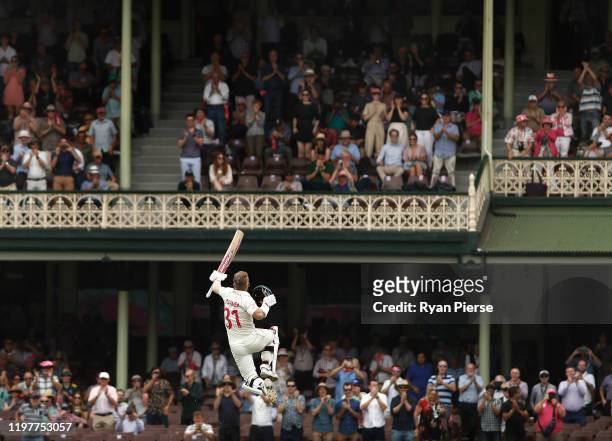 David Warner of Australia celebrates after reaching his century during day four of the Third Test Match in the series between Australia and New...