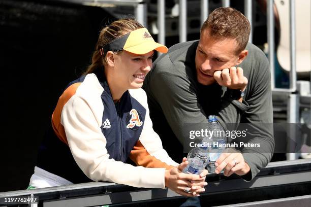 Caroline Wozniacki and husband David Lee looks on during day one of the 2020 ASB Classic at ASB Tennis Centre on January 06, 2020 in Auckland, New...