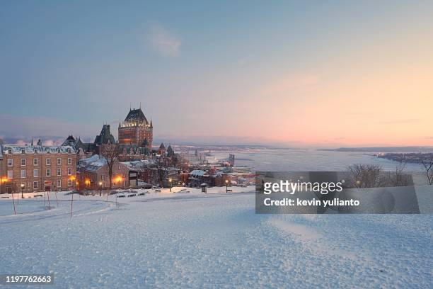 chateau frontenac in quebec city during the sunrise - chateau frontenac hotel stock pictures, royalty-free photos & images