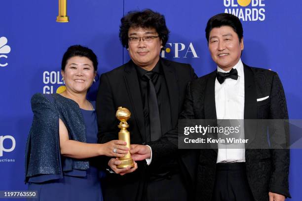 Lee Jung Eun, Bong Joon-ho, and Song Kang-ho pose in the press room with award for Best Motion Picture - Foreign Language for "Parasite" during the...