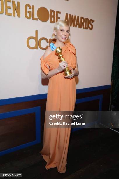 Michelle Williams poses with Golden Globe award for Actress In A Mini-series or Motion Picture for TV for "Fosse/Verdon" at the Official Viewing And...