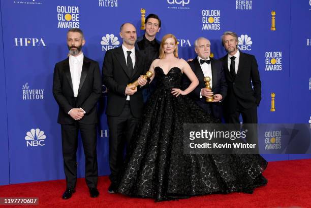 Jeremy Strong, Jesse Armstrong, Nicholas Braun, Sarah Snook, Alan Ruck, and Brian Cox pose with the award for BEST TELEVISION SERIES - DRAMA for...