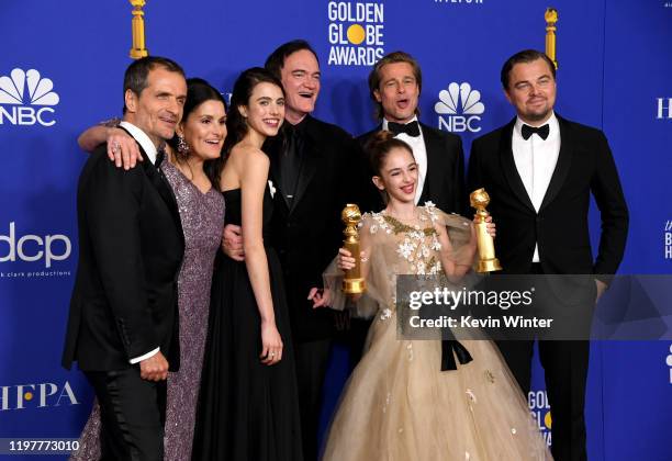 David Heyman, Shannon McIntosh, Margaret Qualley, Quentin Tarantino, Brad Pitt, Julia Butters, and Leonardo DiCaprio pose in the press room with...