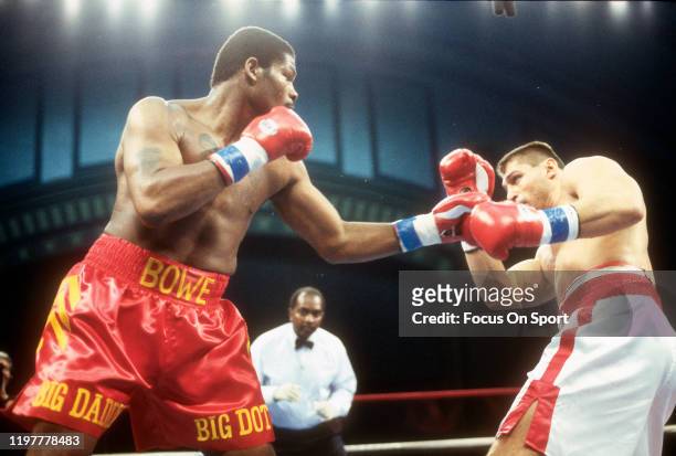 Riddick Bowe and Andrew Golota fights in a heavy weight match on December 14, 1996 at Convention Hall in Atlantic City, New Jersey, U.S..