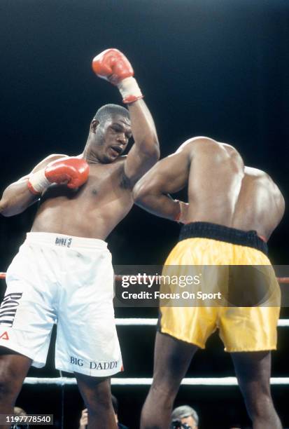 Riddick Bowe and Evander Holyfield fights for the WBA and IBF heavyweight tittle on November 6, 1993 at Caesars Palace in Las Vegas, Nevada.