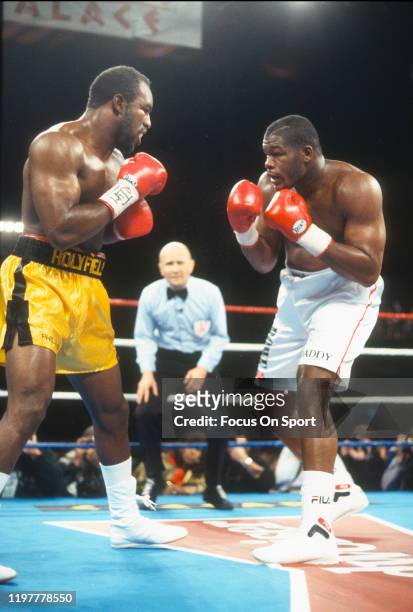 Riddick Bowe and Evander Holyfield fights for the WBA and IBF heavyweight tittle on November 6, 1993 at Caesars Palace in Las Vegas, Nevada.