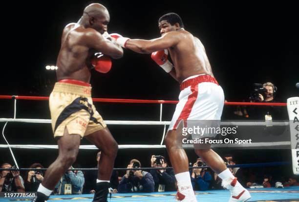 Riddick Bowe fights Evander Holyfield in a heavyweight match on November 4, 1995 at Caesars Palace in Las Vegas, Nevada. Bowe won the fight with a...