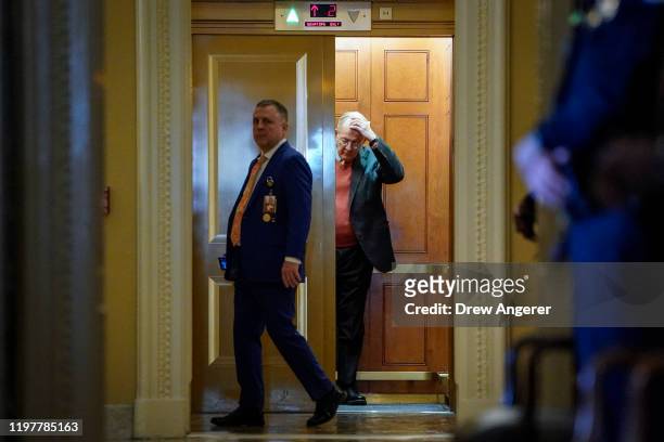 Sen. Lamar Alexander gets into an elevator outside the Senate chamber as the Senate impeachment trial of U.S. President Donald Trump continues at the...