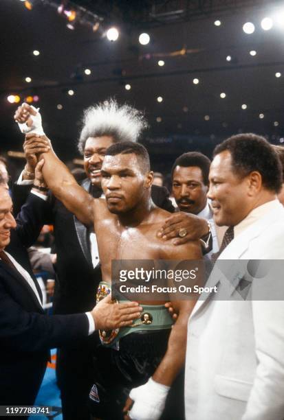 Mike Tyson celebrates with Don King after Tyson defeated Trevor Berbick for the WBC Heavyweight tittle on November 22, 1986 at the Las Vegas Hilton...