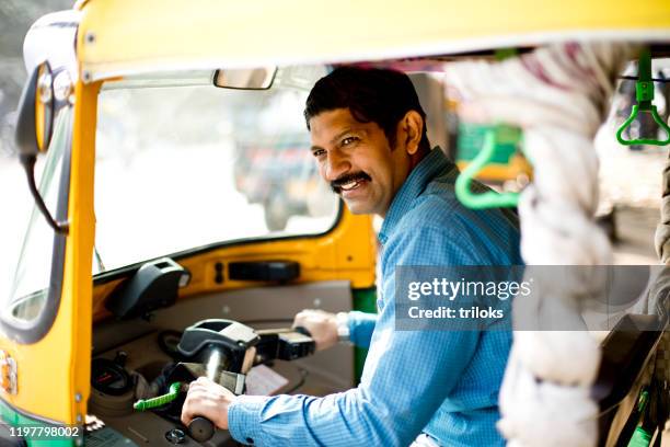 Auto Rickshaw Owner Driving Rickshaws Photos and Premium High Res Pictures - Getty Images