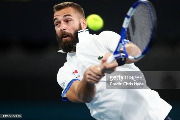 Benoit Paire of France plays a backhand in his match against Dusan Lajovic of Serbia during day four of the 2020 ATP Cup Group Stage at Pat Rafter...