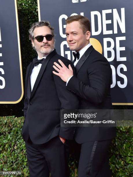 Joaquin Phoenix and Taron Egerton attend the 77th Annual Golden Globe Awards at The Beverly Hilton Hotel on January 05, 2020 in Beverly Hills,...