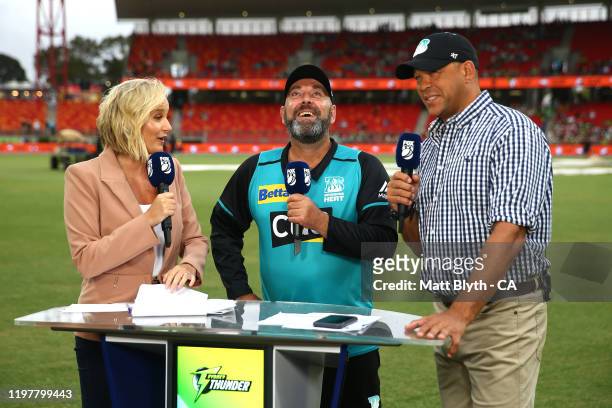 Brisbane Heat coach Darren Lehmann is interviewed by Jessica Yates and Andrew Symonds before the Big Bash League match between the Sydney Thunder and...