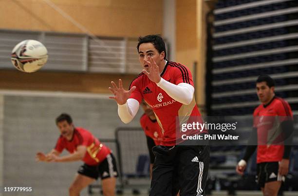 Zac Guildford of the All Blacks takes a pass during a New Zealand All Blacks training session at the Te Rauparaha Arena on July 25, 2011 in...