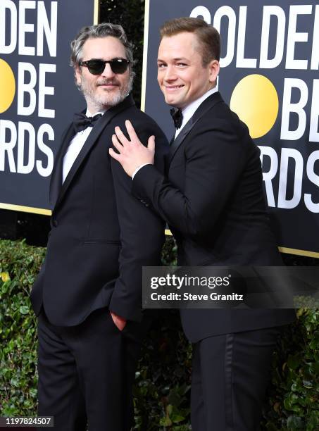 Joaquin Phoenix and Taron Egerton arrives at the 77th Annual Golden Globe Awards attends the 77th Annual Golden Globe Awards at The Beverly Hilton...