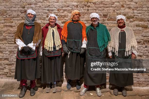 The participants in the Befana regatta pose for a portrait on January 06, 2020 in Venice, Italy. In Italian folklore, Befana is an old woman who...