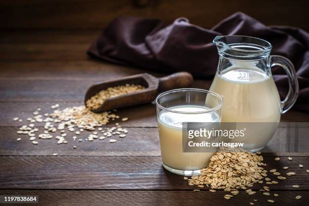 oat milk - fresh organic and vegetarian drinks - oat stock pictures, royalty-free photos & images