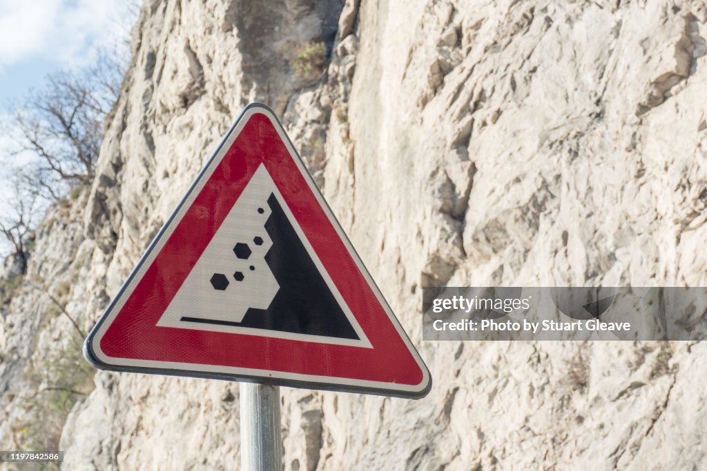Rocks Warning Sign Warning Road Sign For Falling Rocks High-Res Stock Photo - Getty Images