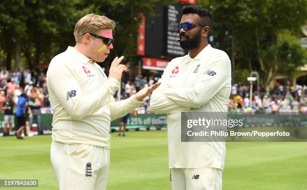 Comedians Romesh Ranganathan and Rob Beckett on the field at lunchtime attempting to catch balls hit by Nasser Hussain during Day Four of the Second...