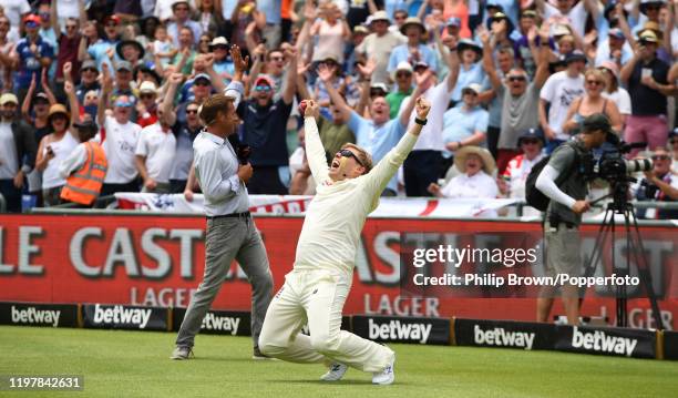 Comedian Rob Beckett celebrates after catching a ball hit by Nasser Hussain as he and Romesh Ranganathan took part in a catching challenge at the...