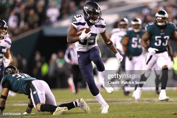 Wide receiver David Moore of the Seattle Seahawks rushes past cornerback Cre'von LeBlanc of the Philadelphia Eagles during their NFC Wild Card...