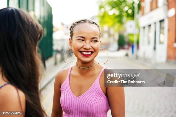 friends laughing - pink lipstick stock-fotos und bilder