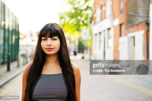 woman looking at camera - long live our independence stock pictures, royalty-free photos & images