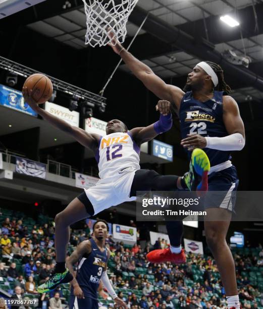 Jared Harper of the Northern Arizona Suns drives against Chad Brown of the Texas Legends during the first quarter on January 31, 2020 at Comerica...