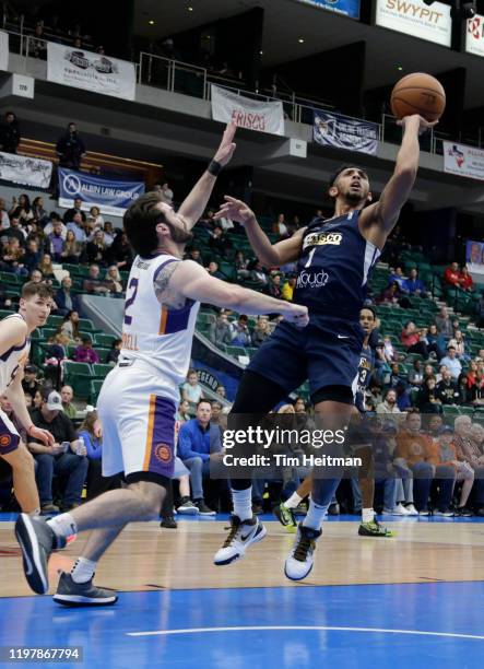 Cameron Payne of the Texas Legends drives against Matt Farrell of the Northern Arizona Suns during the third quarter on January 31, 2020 at Comerica...