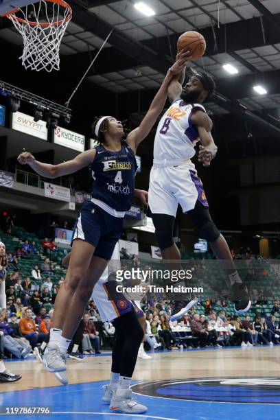 Ike Nwamu of the Northern Arizona Suns grabs a rebound against Moses Brown of the Texas Legends during the third quarter on January 31, 2020 at...