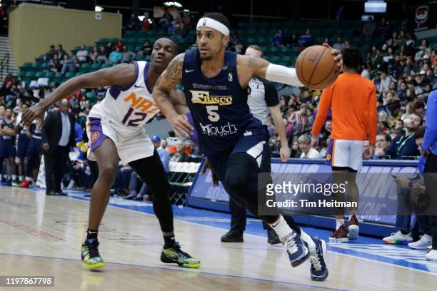 Brandon Fields of the Texas Legends drives against Jared Harper of the Northern Arizona Suns during the fourth quarter on January 31, 2020 at...