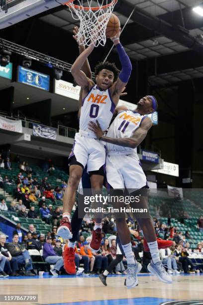 Jalen Lecque of the Northern Arizona Suns of the Northern Arizona Suns grabs a rebound with Tariq Owens of the Northern Arizona Suns during the...