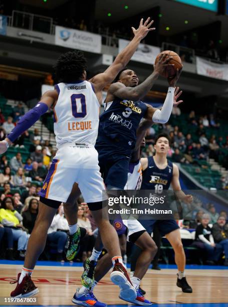 Antonius Cleveland of the Texas Legends shoots against Jalen Lecque of the Northern Arizona Suns during the fourth quarter on January 31, 2020 at...