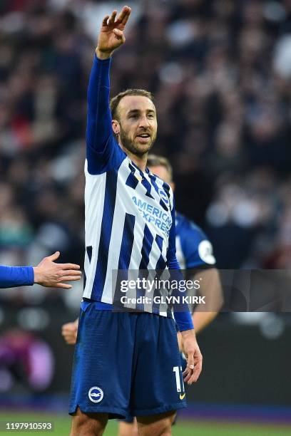 Brighton's English striker Glenn Murray celebrates scoring his team's third goal during the English Premier League football match between West Ham...