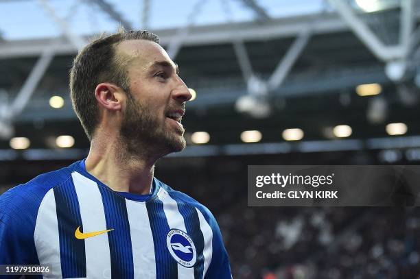 Brighton's English striker Glenn Murray celebrates scoring his team's third goal during the English Premier League football match between West Ham...