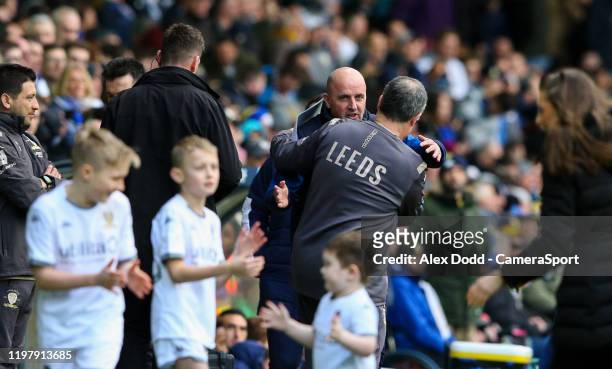 Leeds United manager Marcelo Bielsa greets Wigan Athletic manager Paul Cook during the Sky Bet Championship match between Leeds United and Wigan...