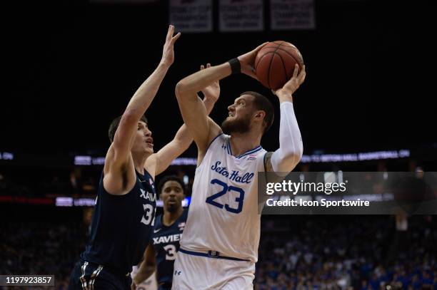 Seton Hall Pirates forward Sandro Mamukelashvili shoots the ball during the second half of the college basketball game between the Xavier Muskateers...