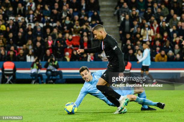 Matis CARVALHO of Montpellier and Kylian MBAPPE of Paris Saint Germain during the French Ligue 1 Soccer match between Paris Saint-Germain and...