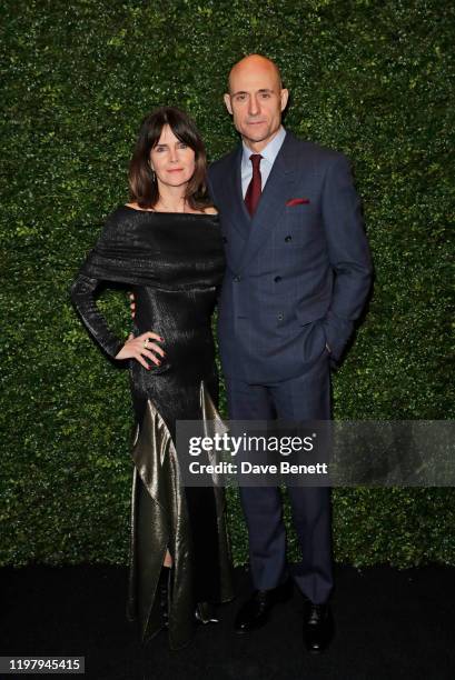 Liza Marshall and Mark Strong arrive at the Charles Finch & CHANEL Pre-BAFTA Party at 5 Hertford Street on February 1, 2020 in London, England.