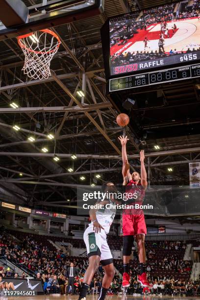 Sagaba Konate of the Mississauga Raptors 905 shoots the ball over Brandon McCoy of the Wisconsin Herd at the Paramount Fine Foods Centre on February...