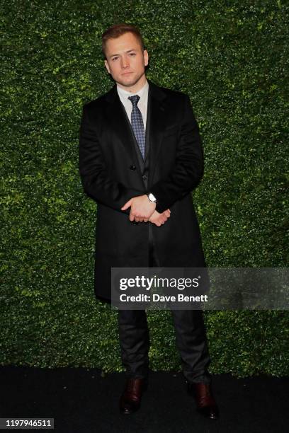 Taron Egerton arrives at the Charles Finch & CHANEL Pre-BAFTA Party at 5 Hertford Street on February 1, 2020 in London, England.