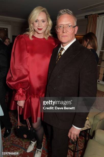 Gwendoline Christie and Giles Deacon arrive at the Charles Finch & CHANEL Pre-BAFTA Party at 5 Hertford Street on February 1, 2020 in London, England.