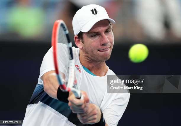 Cameron Norrie of Great Britain plays a backhand during his Group C singles match against Alexander Cozbinov of Moldova during day five of the 2020...